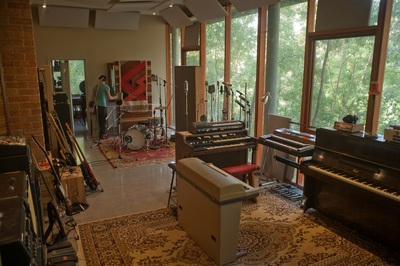Main live room for recording with keyboards and drums
