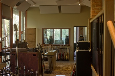 main recording room with mic's microphones and sound treatment